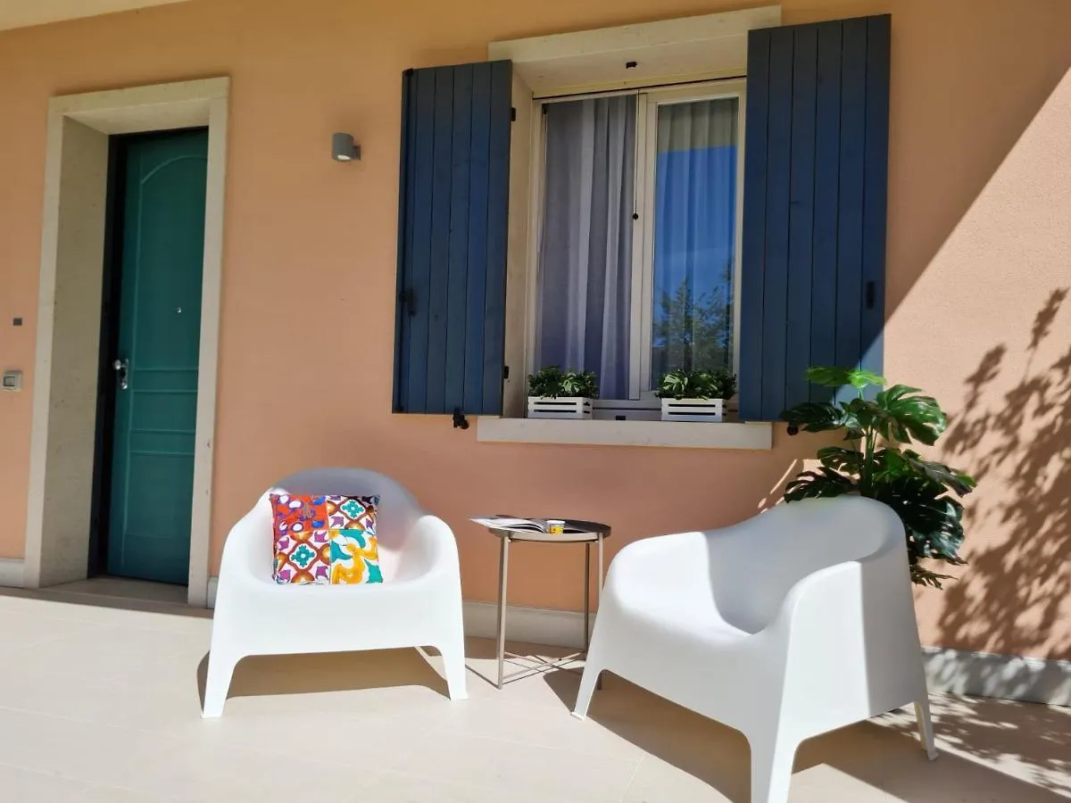 Апартаменты Alma Garda Home Сирмионе